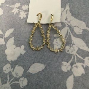 Gold  toned loop earrings with clear  rhinestones